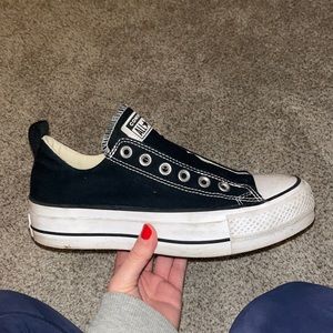 Platform black Converse.